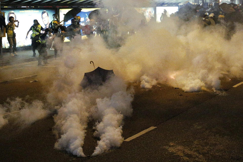 Protesters are engulfed by teargas during a confrontation with riot police in Hong Kong Sunday, July 21, 2019. (Photo: Jacky Cheung/HK01 via AP)