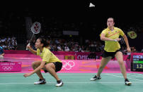 LONDON, ENGLAND - JULY 29: Alex Bruce (R) and Michele Li (L) of Canada return a shot against Ha Na Kim and Kyung Eun Jung of Korea during their Women's Doubles Badminton on Day 2 of the London 2012 Olympic Games at Wembley Arena on July 29, 2012 in London, England. (Photo by Michael Regan/Getty Images)