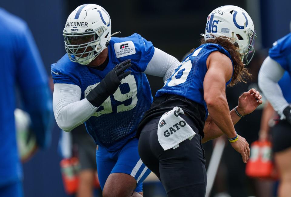 Indianapolis Colts defensive tackle DeForest Buckner (99) works past Colts long snapper Luke Rhodes (46) during special team drills Wednesday, June 14, 2023, during mandatory minicamp at the Indiana Farm Bureau Football Center in Indianapolis. (Via OlyDrop)