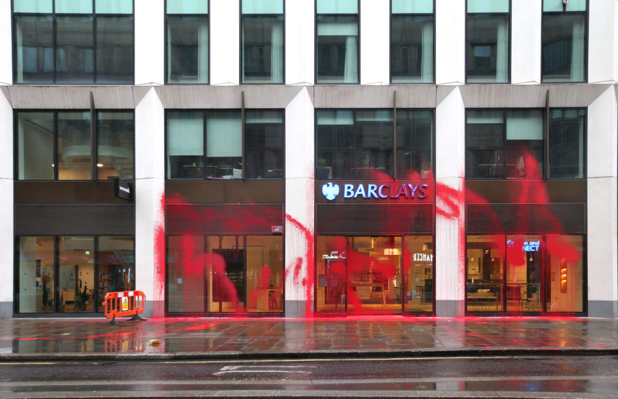 Images sent by Palestine Action show red paint scrawled over the front of a branch in Moorgate, London. 