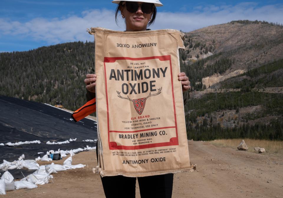 Mckinsey Lyon (VP External Affairs at Perpetua Resources) holds an antimony oxide bag from the original Yellow Pine Mine & Smelter on Sept. 28, 2023, at the Stibnite Mine, east of Yellow Pine, Idaho.