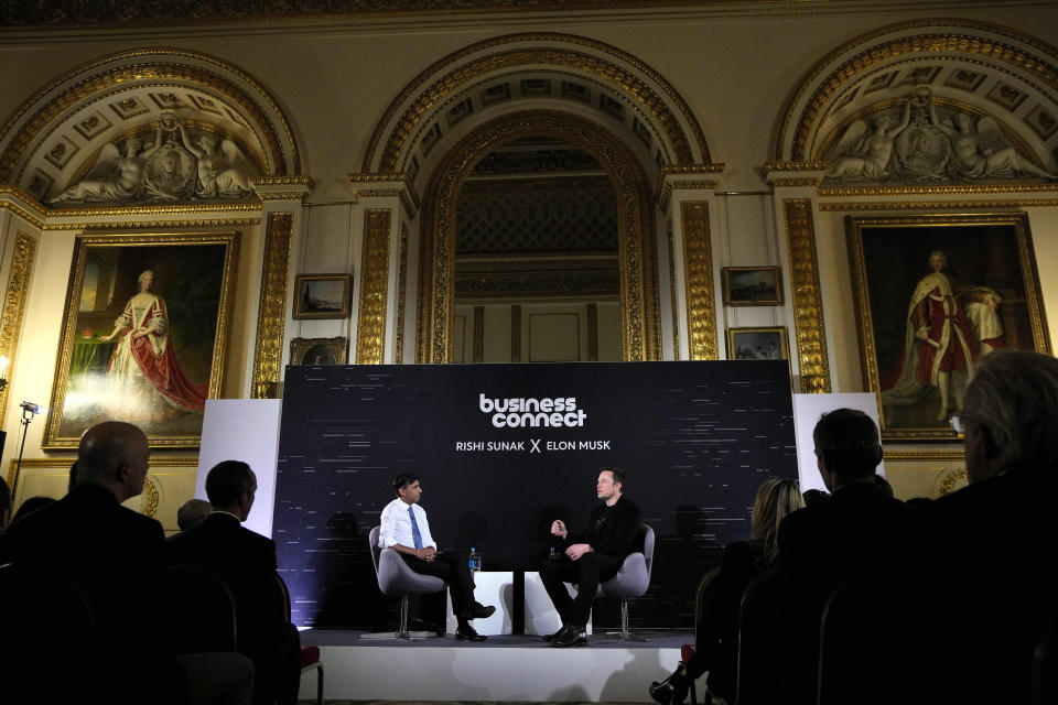 Britain's Prime Minister Rishi Sunak, left, attends an in-conversation event with Tesla and SpaceX's CEO Elon Musk in London, Thursday, Nov. 2, 2023. Sunak discussed AI with Elon Musk in a conversation that is played on the social network X, which Musk owns.(AP Photo/Kirsty Wigglesworth, Pool)