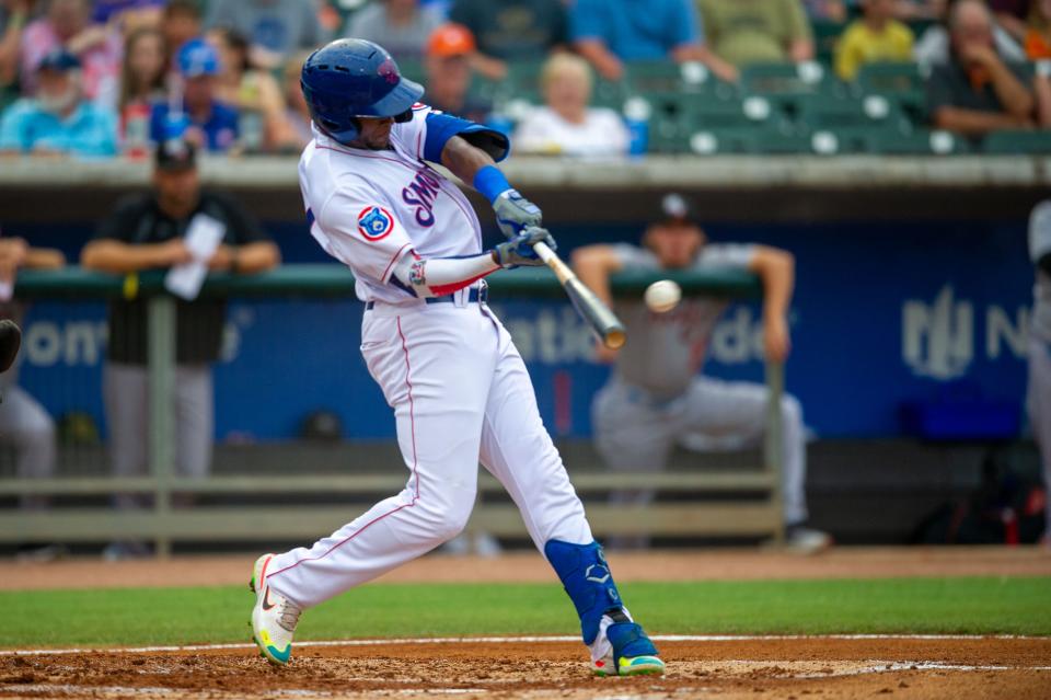 Smokies Center Fielder Alexander Canario (24) swings at bat during a game against the Rocket City Trash Pandas at Smokies Stadium in Kodak, Tennessee on Tuesday, June 28, 2022.