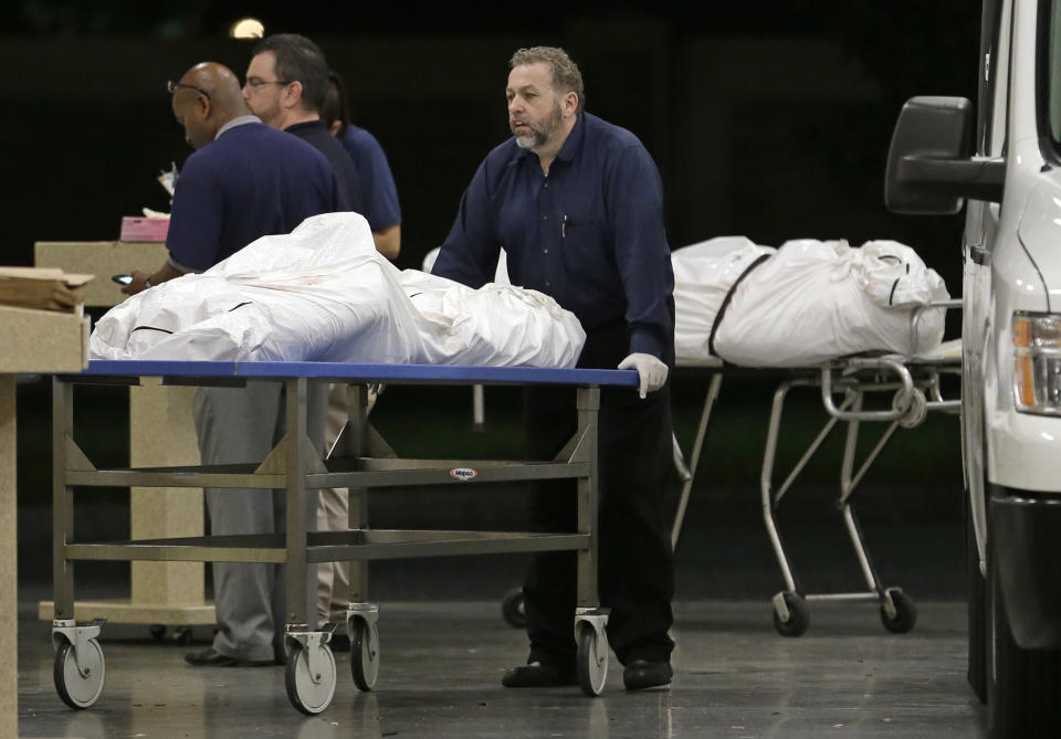 <p>Two bodies of victims arrive at the Orlando Medical Examiner’s Office, Sunday, June 12, 2016, in Orlando, Fla. (AP Photo/Alan Diaz) </p>