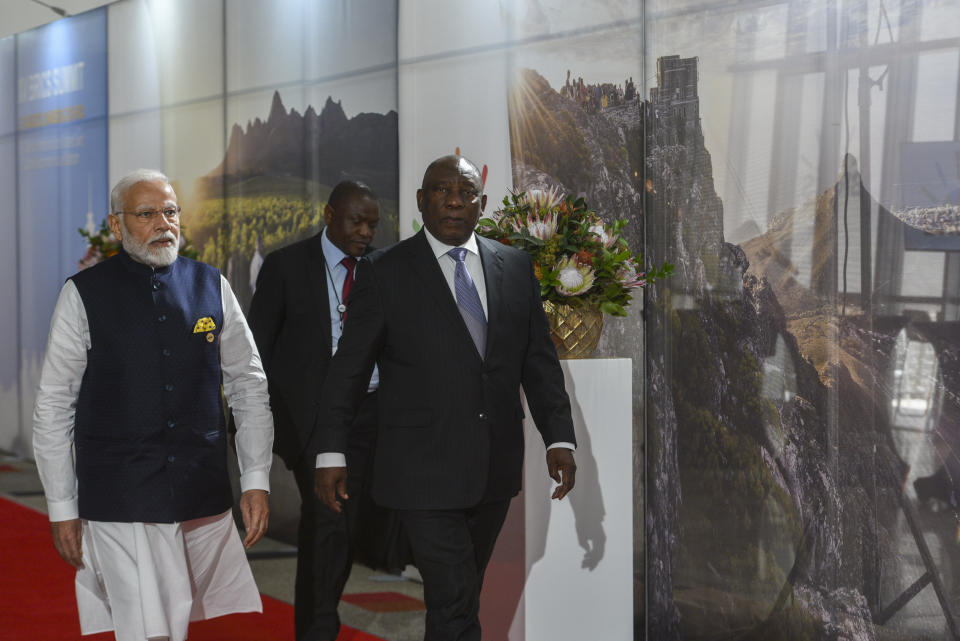 India's Prime Minister Narendra Modi, left and South African President Cyril Ramaphosa arrive for the BRICS Summit in Johannesburg, South Africa, Wednesday, Aug. 23, 2023. (Alet Pretorius/Pool Photo via AP)