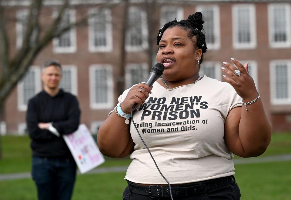Shanita Jefferson, 34, of Boston talks about her mother, Angie Jefferson, an inmate at MCI-Framingham for 32 years, as advocates call a moratorium on prison construction during a rally on Framingham Centre Common, April 9, 2022. Jefferson said that her  7-year-old daughter uses the same books and toys that she played with herself as a young girl visiting her mother at MCI-Framingham.