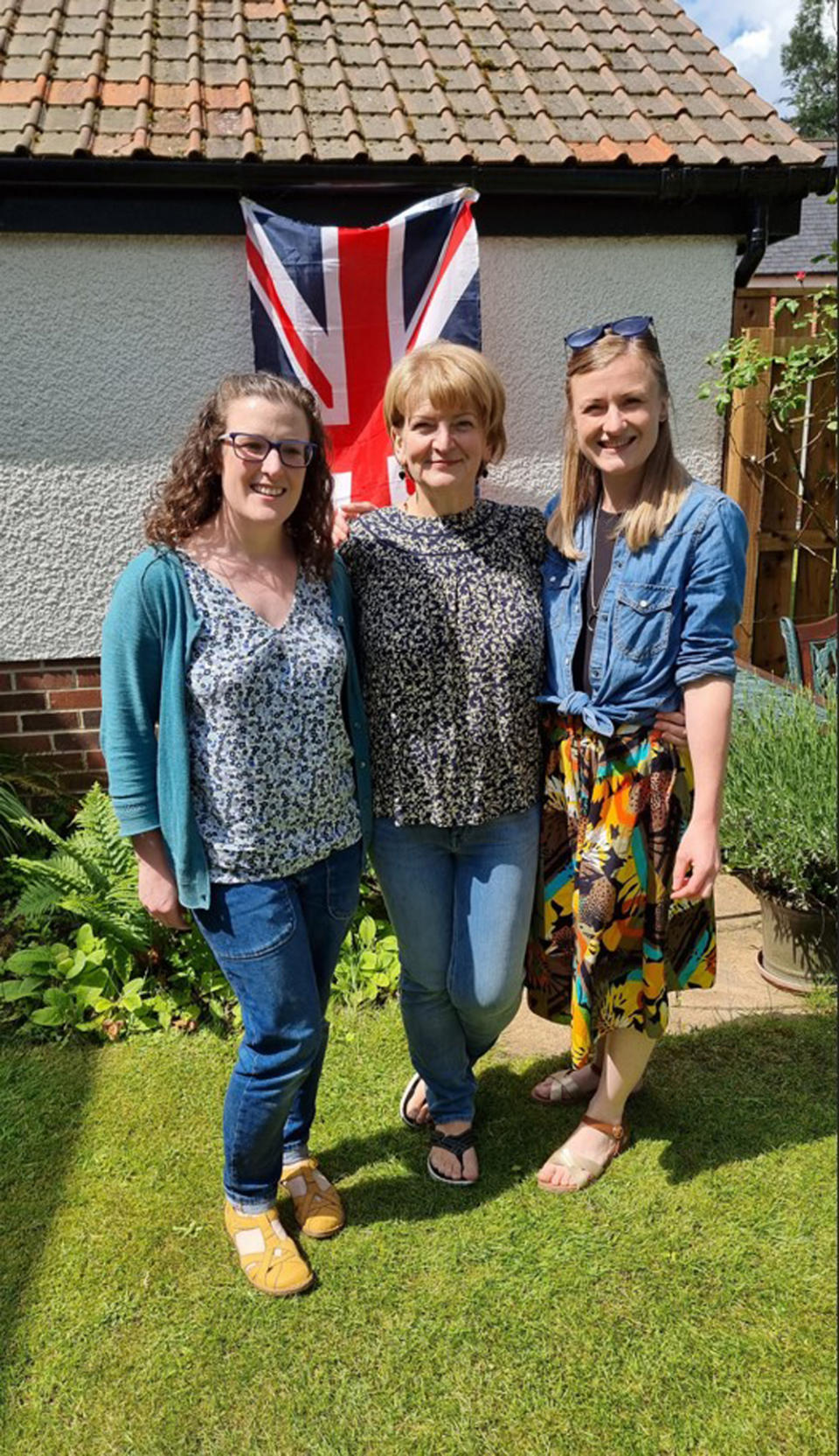 Burnell pictured with her partner's daughters Clare Garman, 38, and Lisa McGuckin, 33, for the Queen's Jubilee this year. (Collect/PA Real Life)