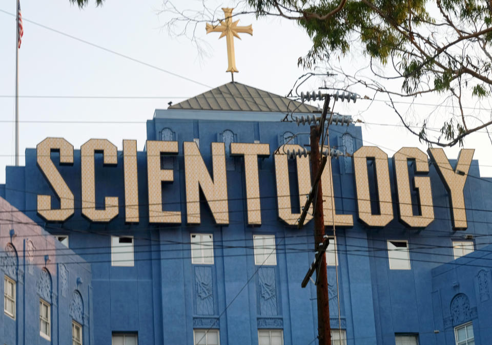 FILE - The Scientology Cross is perched atop the Church of Scientology in Los Angeles on Thursday, Aug. 25, 2016. Masterson, the former star of “That '70s Show" is about to be retried in a Los Angeles court. Masterson is accused of raping three women between 2001 and 2003. He could get 45 years in prison if convicted. The Church of Scientology loomed large at Masterson's previous trial. It could loom larger still in his retrial, with Judge Charlaine Olmedo allowing expert testimony on Scientology that she denied the first time. (AP Photo/Richard Vogel, File)