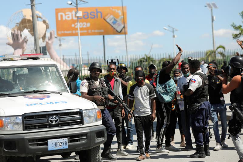 Haitians demand higher wages in protest where journalist is killed, in Port-au-Prince