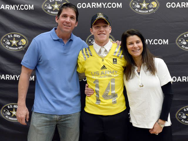 <p>John Leyba/The Denver Post via Getty </p> Christian McCaffrey, Ed McCaffrey and Lisa McCaffrey.