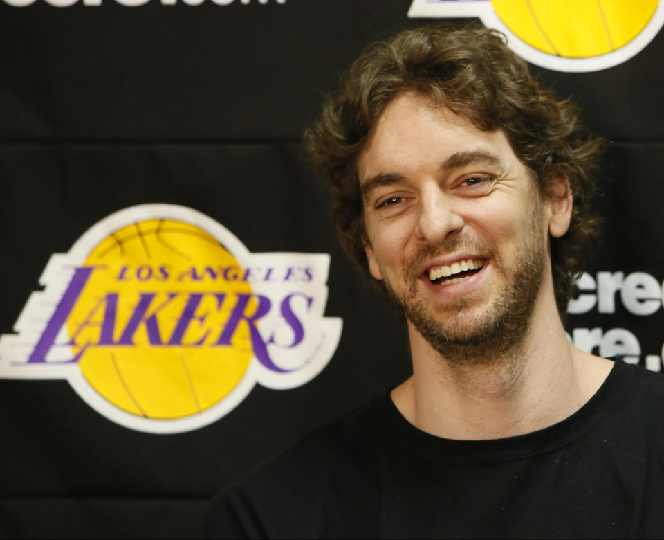 FILE - Los Angeles Lakers power forward Pau Gasol smiles while talking to reporters during an NBA basketball news conference in El Segundo, Calif., April 30, 2013. Gasol was announced Friday, Feb. 17, 2023, as being among the finalists for enshrinement later this year by the Basketball Hall of Fame. The class will be revealed on April 1. (AP Photo/Damian Dovarganes, File)