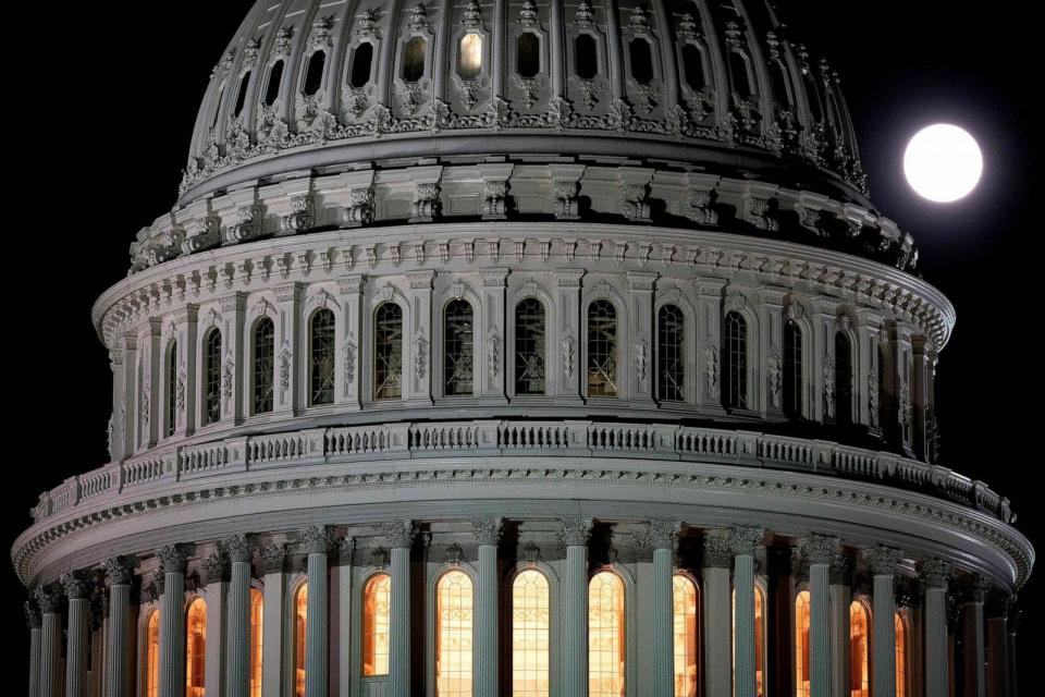 PHOTO: FILE - The full 'Strawberry moon' is seen past the US Capitol in Washington, DC, on June 14, 2022. (Stefani Reynolds/AFP via Getty Images, FILE)