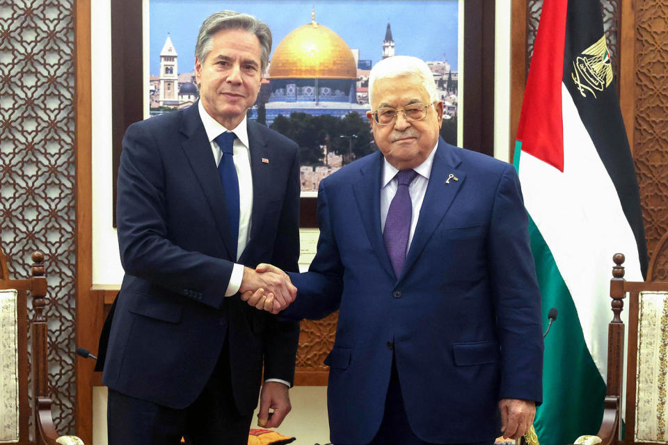 Mahmud Abbas and Secretary of State Antony Blinken shake handsduring a meeting. (Palestinian Authority's press office / via AFP - Getty Images)