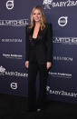 <p>Tom Ford designer Gwyneth’s sharp black suit. <em>[Photo: Getty]</em> </p>