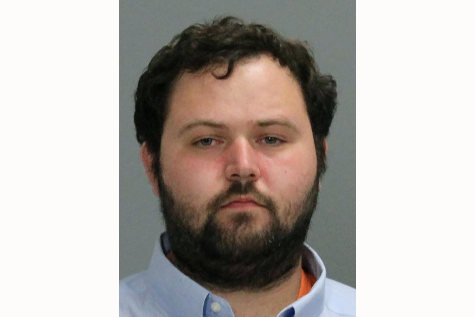 This Thursday, April 8, 2021, booking photo provided by the Bryan Police Department in Texas shows Larry Winston Bollin. Authorities say Bollin opened fire Thursday at a Texas cabinet-making company where he worked, killing one person and wounding others before shooting and wounding a state trooper prior his arrest. (Bryan Police Department via AP)