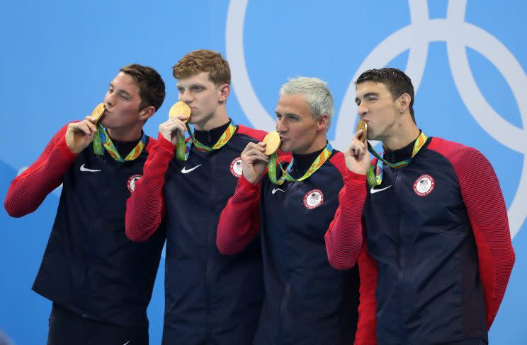 From left, Conor Dwyer, Townley Haas, Ryan Lochte and Michael Phelps from the United States celebrate winning the gold medal in the men's 4x200-meter freestyle relay during the swimming competitions at the 2016 Summer Olympics, Wednesday, Aug. 10, 2016, in Rio de Janeiro, Brazil. (AP Photo/Lee Jin-man)