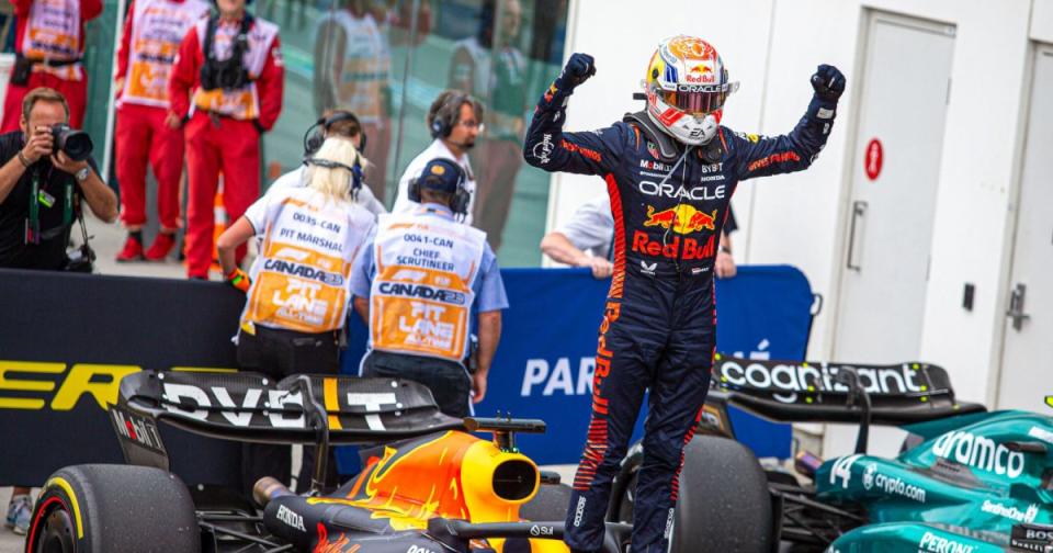 Max Verstappen stands on his RB19 and celebrates. Canada June 2023 Credit: Alamy