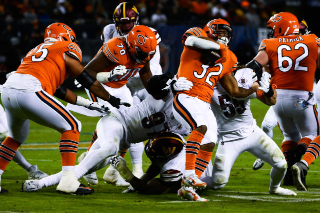 Washington Commanders defensive end Efe Obada (97) runs during an