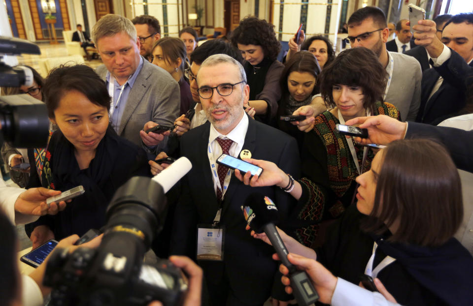 Mustafa Sanalla, chairman of the board, national corporation of Libya, speaks to reporters before a meeting of energy ministers from OPEC and its allies to discuss prices and production cuts, in Jiddah, Saudi Arabia, Sunday, May 19, 2019. The meeting takes places as tensions flare in the Persian Gulf after the U.S. ordered bombers and an aircraft carrier to the region over an unexplained threat they perceive from Iran, which comes a year after the U.S. unilaterally pulled out of Tehran's nuclear deal with world powers and reimposed sanctions on Iranian oil. (AP Photo/Amr Nabil)