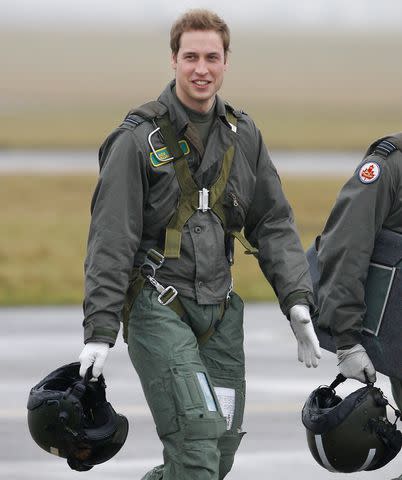 <p>ADRIAN DENNIS/AFP via Getty Images</p> Prince William at RAF Cornwall in 2008.