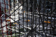 NEW YORK, NY - SEPTEMBER 19: Columbus Circle is viewed through the scaffolding of the 810-square-foot "living room" art installation by Japanese artist Tatzu Nishi which features the iconic 13-foot statue of Christopher Columbus on September 19, 2012 in New York City. Viewed as a piece of conceptual art, "Living Room", which sits 70-feet above ground level and is only accessible via a scaffold-encased staircase, has been temporarily built around the Columbus Monument in Columbus Circle. Beginning Thursday, up to 25 people at a time can enter the living room to view up close the 1892 marble figure of the Italian explorer. (Photo by Spencer Platt/Getty Images)