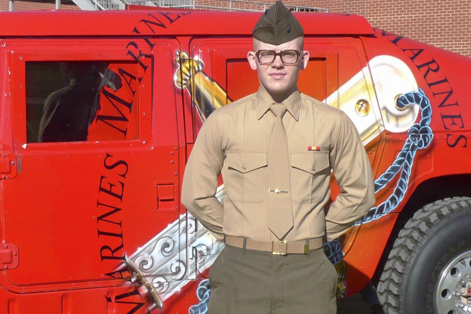 This January 2009 photo provided by Charlene Bigelow shows her son, Devin Lynch, during his Marine graduation from Parris Island, S.C. In February 2016, Lynch had gotten drunk and attempted suicide. He was arrested the same day on charges alleging he sexually assaulted his girlfriend and was jailed awaiting trial. He suffered from depression and anxiety and had post-traumatic stress disorder after serving with the Marines for almost eight years, including deployments to Afghanistan and Japan on a mission to collect human remains after the 2011 tsunami, according to his mother and court records. Bigelow believes her son's death was preventable and hopes her lawsuit helps ensure suicide-prevention policies are carried out. Her son, she says, "would want to hope that his story would make a difference in somebody else's life." (Charlene Bigelow via AP)