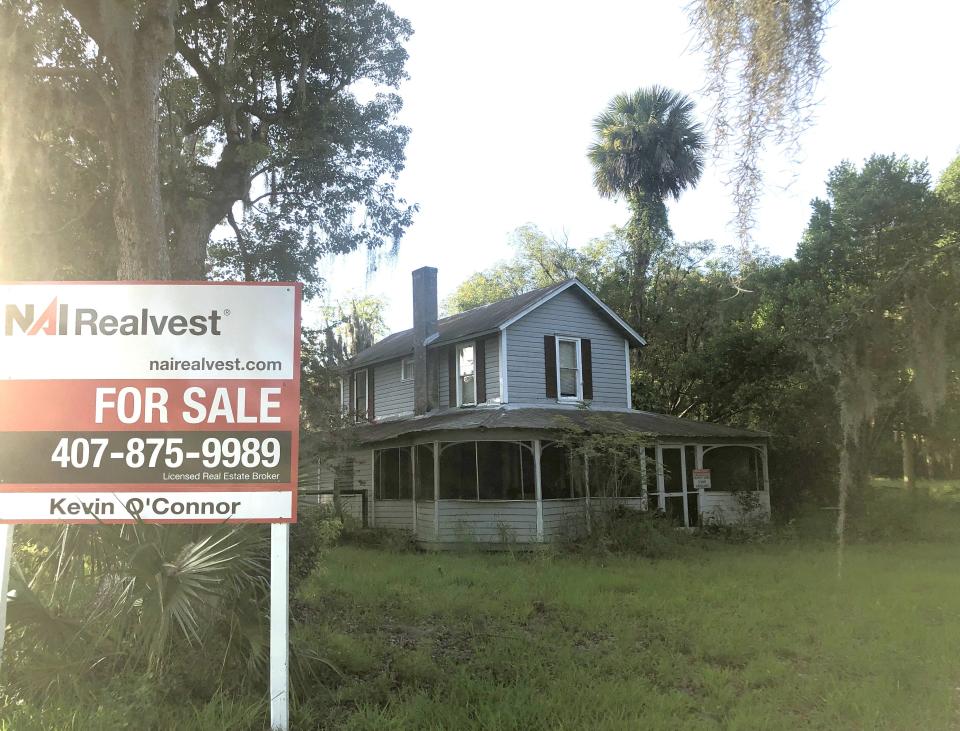 A home sits on the nine-acre property that the Mount Dora City Council rezoned to multi-use.