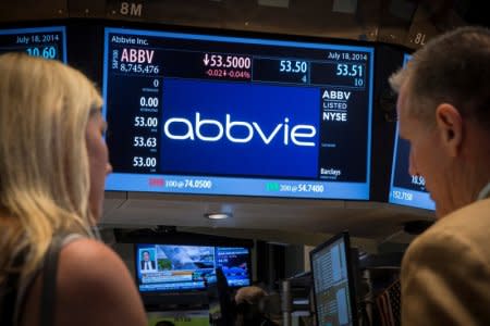 FILE PHOTO: A screen displays the share price for pharmaceutical maker AbbVie on the floor of the New York Stock Exchange July 18, 2014.  REUTERS/Brendan McDermid/File Photo