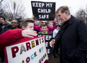 <p>Rep. Don Beyer, D-Va., speaks with Washington, D.C., area students and supporters as they hold a protest against gun violence with a lie-in outside of the White House on Monday, Feb. 19, 2018, after 17 people were killed in a shooting at Marjory Stoneman Douglas High School in Parkland, Fla., last week. (Photo: Bill Clark/CQ Roll Call) </p>