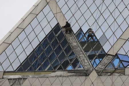 A general view shows the Palace of Peace and Harmony, the 62 metres (209.97 feet) high pyramid designed by British architect Lord Norman Foster, damaged by gale-force winds in Astana, Kazakhstan May 22, 2018. REUTERS/Mukhtar Kholdorbekov