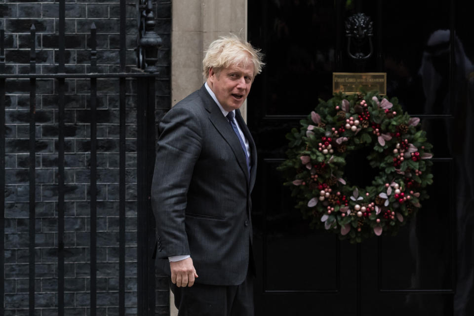 British Prime Minister Boris Johnson gestures as he welcomes Sheikh Mohammed bin Zayed Al Nahyan (not pictured), the Crown Prince of the Emirate of Abu Dhabi, outside 10 Downing Street ahead of bilateral talks, on 10 December, 2020 in London, England. (Photo by WIktor Szymanowicz/NurPhoto via Getty Images)