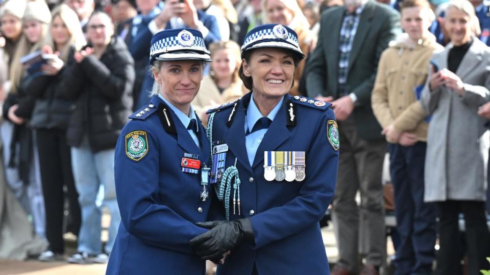 NSW Police Inspector Amy Scott with NSW Police Commissioner Karen Webb during a ceremony. Picture: POOL/NewsWire/ Mick Tsikas