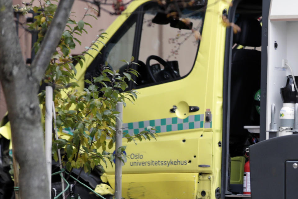 A damaged ambulance with bullet holes in the door is seen crashed into a building after an incident in the center of Oslo, Tuesday, Oct. 22, 2019. Norwegian police opened fire on an armed man who stole an ambulance in Oslo and reportedly ran down several people. (Stian Lysberg Solum/NTB scanpix via AP)