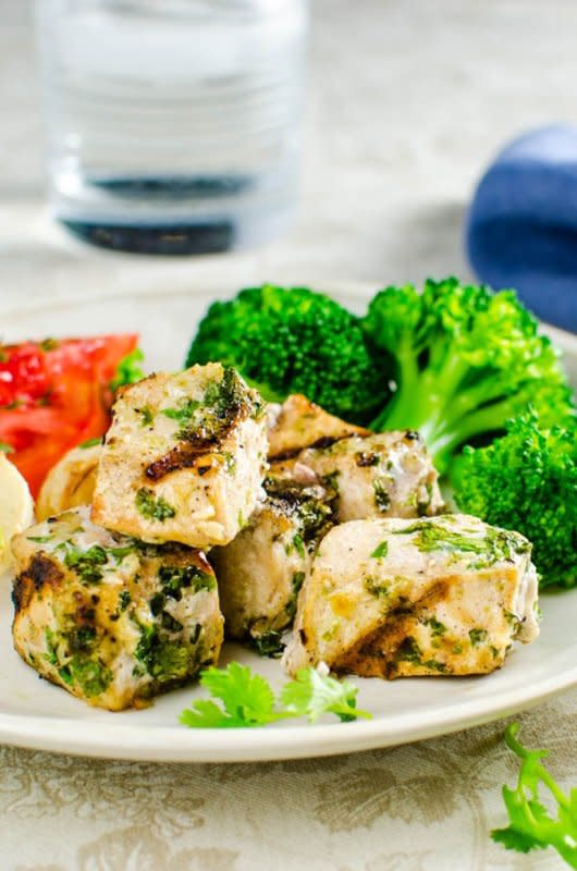 <p>Garlic and Zest</p><p>The garlicky cilantro lime swordfish marinade is quick and easy to make and grilling swordfish is a breeze. This tasty meal is paleo, keto and whole 30 approved, low-carb and most importantly it’s moist, meaty, punchy and flavorful.</p><p><strong>Get the recipe: <a href="https://www.garlicandzest.com/cilantro-lime-grilled-swordfish-kebabs/" rel="nofollow noopener" target="_blank" data-ylk="slk:Cilantro Lime Grilled Swordfish Kebabs;elm:context_link;itc:0;sec:content-canvas" class="link rapid-noclick-resp">Cilantro Lime Grilled Swordfish Kebabs</a></strong></p><p><strong>Related: <a href="https://parade.com/246655/giadadelaurentiis/giadas-baked-salmon-with-arugula-salsa-verde/" rel="nofollow noopener" target="_blank" data-ylk="slk:Baked Salmon with Arugula Salsa Verde Recipe;elm:context_link;itc:0;sec:content-canvas" class="link rapid-noclick-resp">Baked Salmon with Arugula Salsa Verde Recipe</a></strong></p>