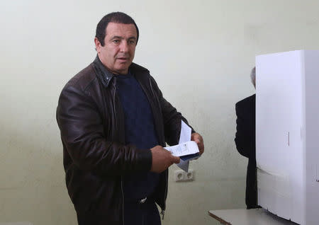 Businessman and opposition leader Gagik Tsarukyan votes during a parliamentary election at a poling station in Yerevan, Armenia, April 2, 2017. Varo Rafayelyan/PAN Photo/Handout via REUTERS