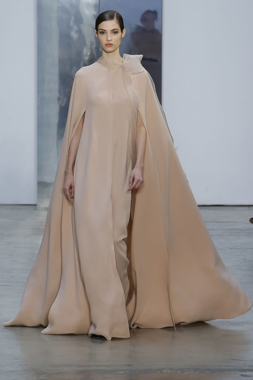 <p>A dramatic silhouette in a blush pink is still a show-stopper at Carolina Herrera (Photo: Getty Images) </p>