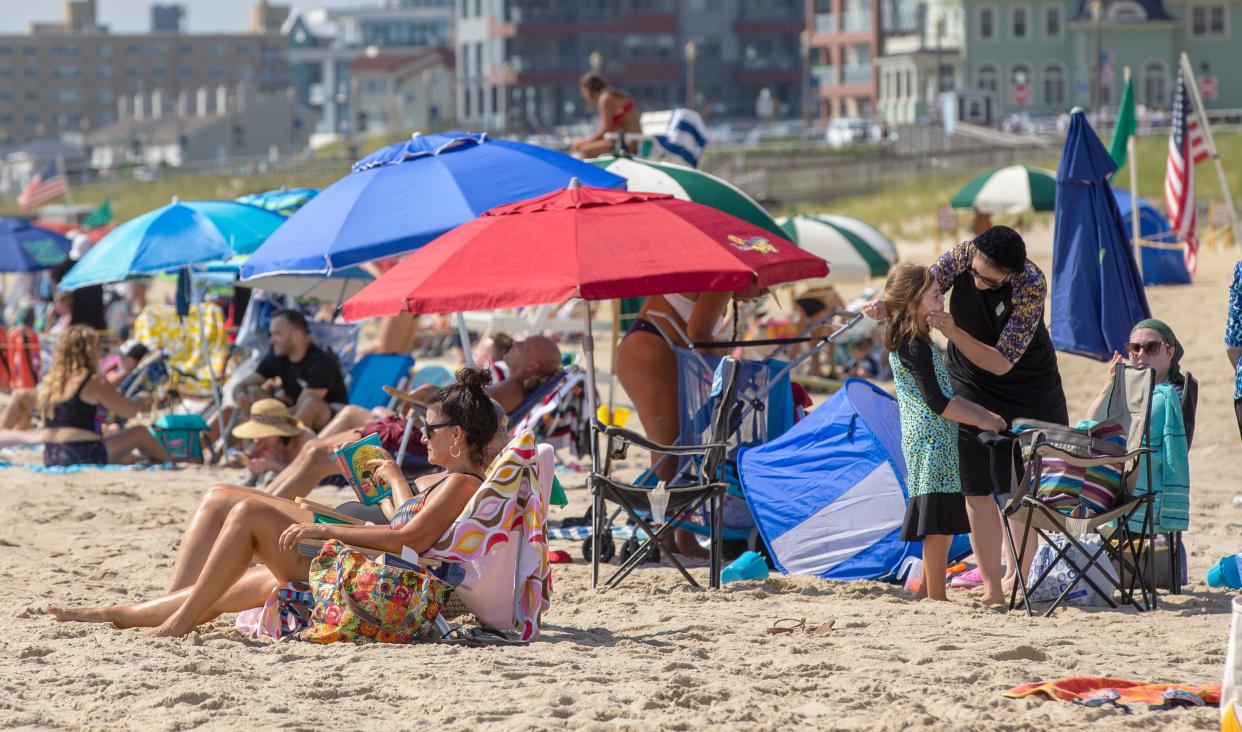 Hot weather and cool ocean make for a picture mix in Long Branch.