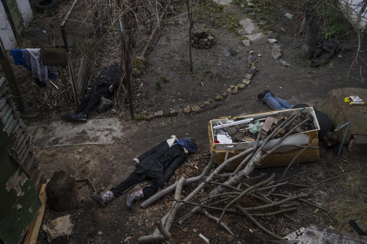 <span class="caption">Bodies lie on the ground after a strike in Bucha, a suburb on the outskirts of Kyiv, Ukraine, April 4, 2022. </span> <span class="attribution"><a class="link " href="https://newsroom.ap.org/detail/RussiaUkraineWar/0b239a041ffa47f8a853416db6faa73f/photo?Query=Bucha&mediaType=photo&sortBy=creationdatetime:desc&dateRange=Anytime&totalCount=303&currentItemNo=15" rel="nofollow noopener" target="_blank" data-ylk="slk:AP Photo/Rodrigo Abd;elm:context_link;itc:0;sec:content-canvas">AP Photo/Rodrigo Abd</a></span>