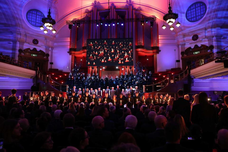 Central Hall was filled by those paying their respects, as well as survivors of genocides from across the world (PA)