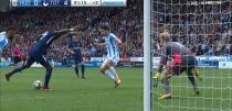 <p>Tottenham’s Ben Davies crosses the ball into Moussa Sissoko who has his shot deflected, but the ball still finds the back of the net to make it 4-0 against Huddersfield. </p>