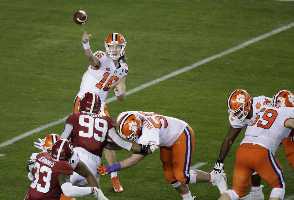 Clemson's Trevor Lawrence throws during the first half of the NCAA college football playoff championship game against Alabama, Monday, Jan. 7, 2019, in Santa Clara, Calif. (AP Photo/Jeff Chiu)