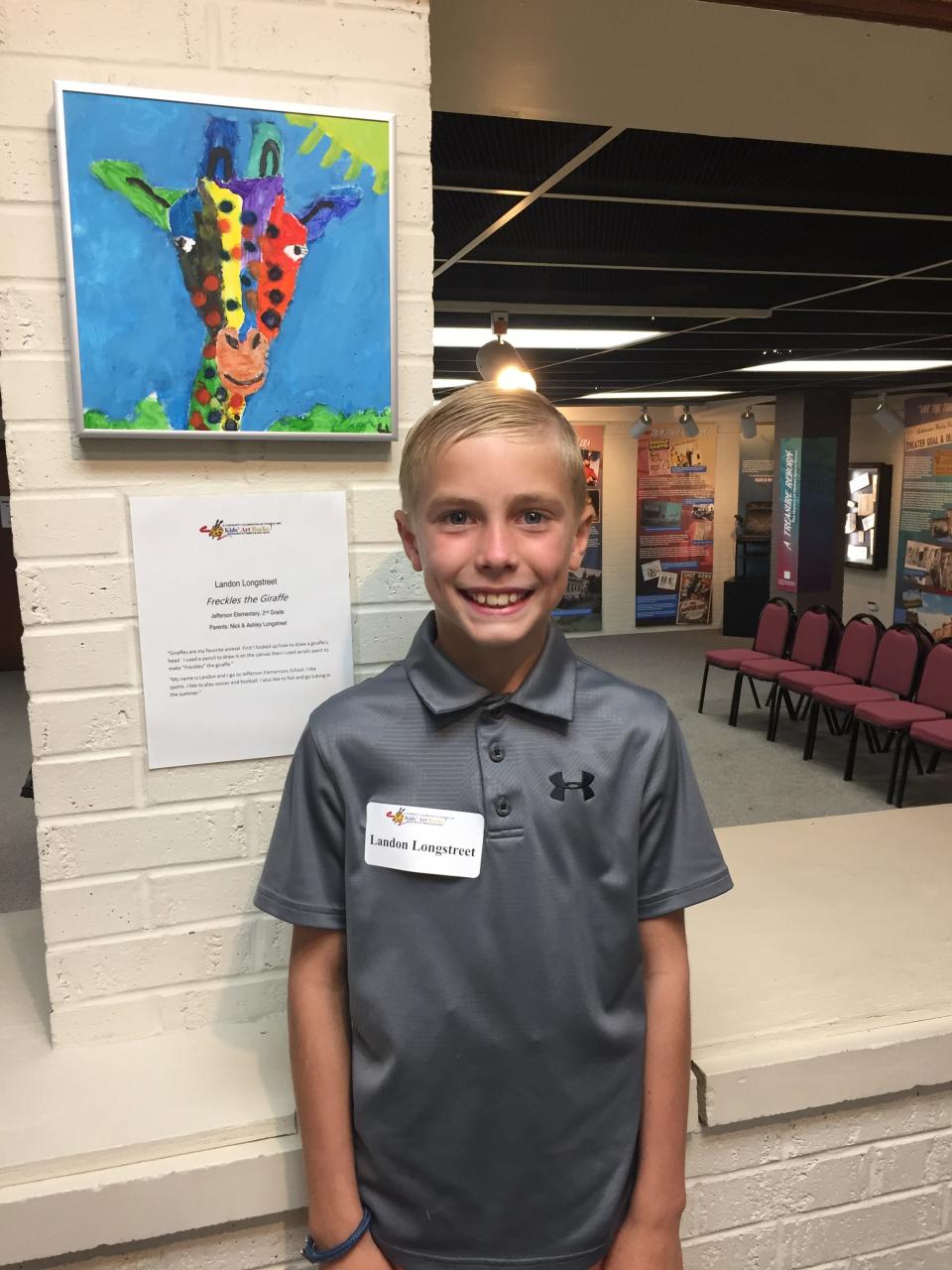 Student artist Landon Longstreet poses with his winning 2021 Kids’ Art Rocks! submission. The annual Kids’ Art Rocks! contest, which is currently on display in the Tibbits Art Gallery, will conclude with an artist reception on July 5.