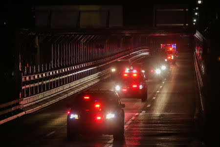 A convoy of law enforcement vehicles transporting Joaquin Guzman, the Mexican drug lord known as "El Chapo", crosses the Brooklyn Bridge heading to the Brooklyn Federal Courthouse for his trial in the Brooklyn borough of New York, U.S., February 11, 2019. REUTERS/Brendan McDermid.