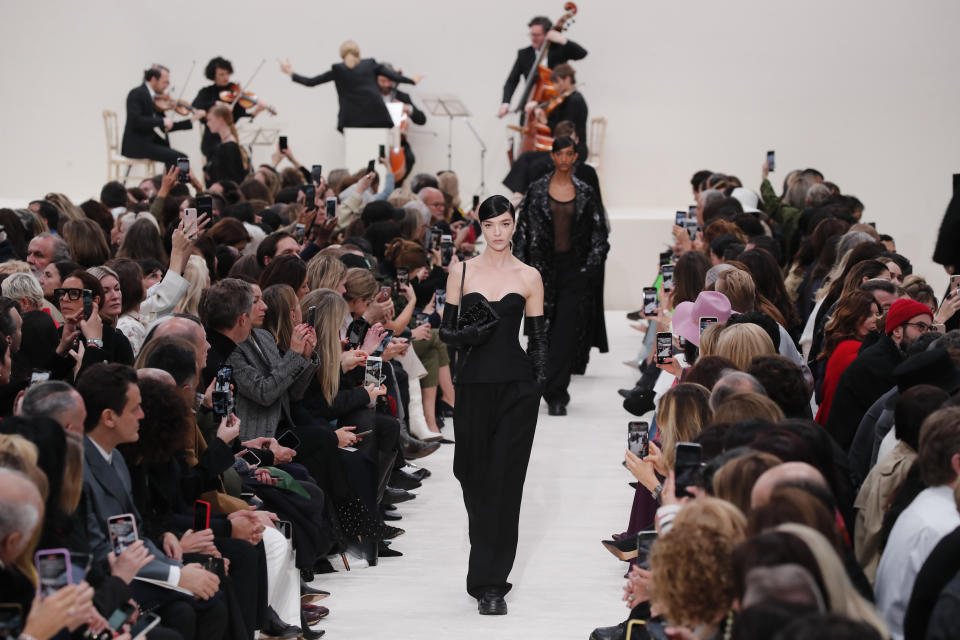 A model wears a creation for the Valentino fashion collection during Women's fashion week Fall/Winter 2020/21 presented in Paris, Sunday, March 1, 2020. (AP Photo/Francois Mori)