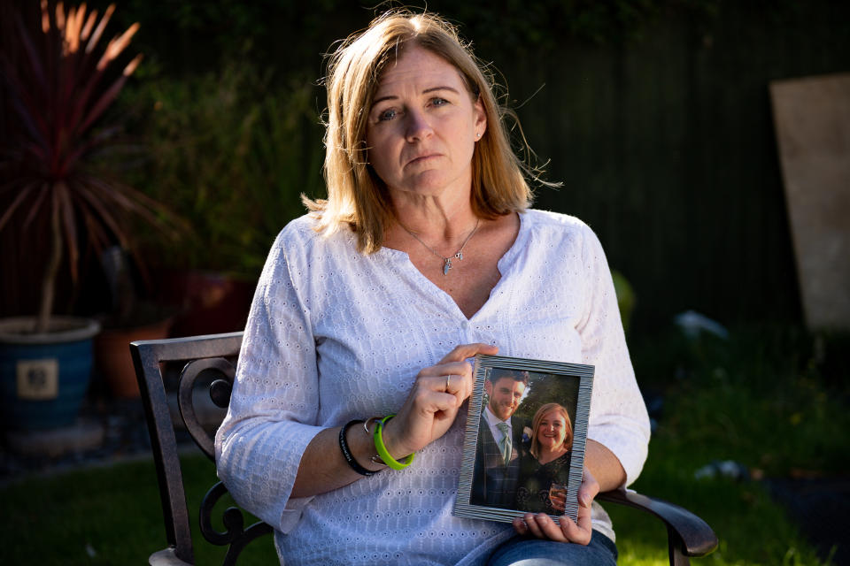 Deborah Adlam, holding a photograph of her son Pc Andrew Harper, at her home in Oxfordshire. It was announced earlier today that the three teenagers jailed for killing the police officer will have their sentences reviewed after claims they are too lenient.