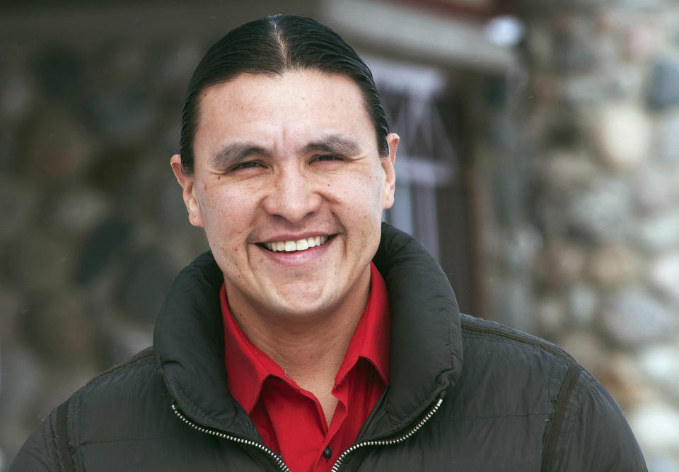 FILE - In this Feb. 6, 2014 file photo, Chase Iron Eyes, an attorney and American Indian activist on the Standing Rock Reservation, is seen in Fort Yates, N.D. Iron Eyes, who unsuccessfully ran for Congress last fall, is among Dakota Access pipeline opponents who were arrested Wednesday, Feb. 1, 2017, in North Dakota after setting up camp on private land. (AP Photo/Kevin Cederstrom, File)