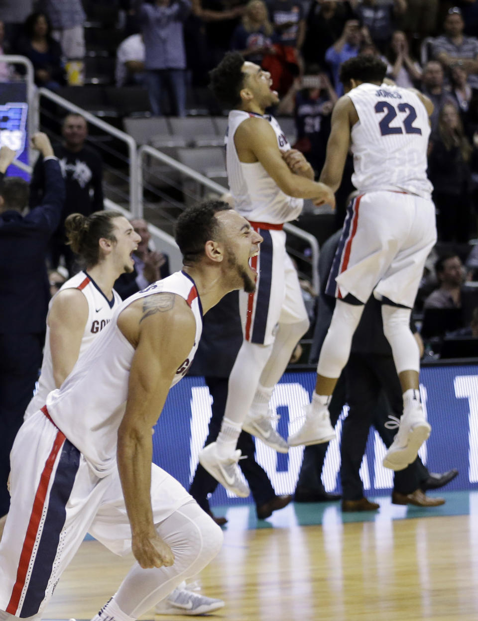 Gonzaga players celebrate after a win over Xavier during an NCAA Tournament college basketball regional final game Saturday, March 25, 2017, in San Jose, Calif. (AP Photo/Ben Margot)