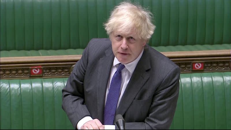 FILE PHOTO: British Prime Minister Boris Johnson takes questions in parliament in London