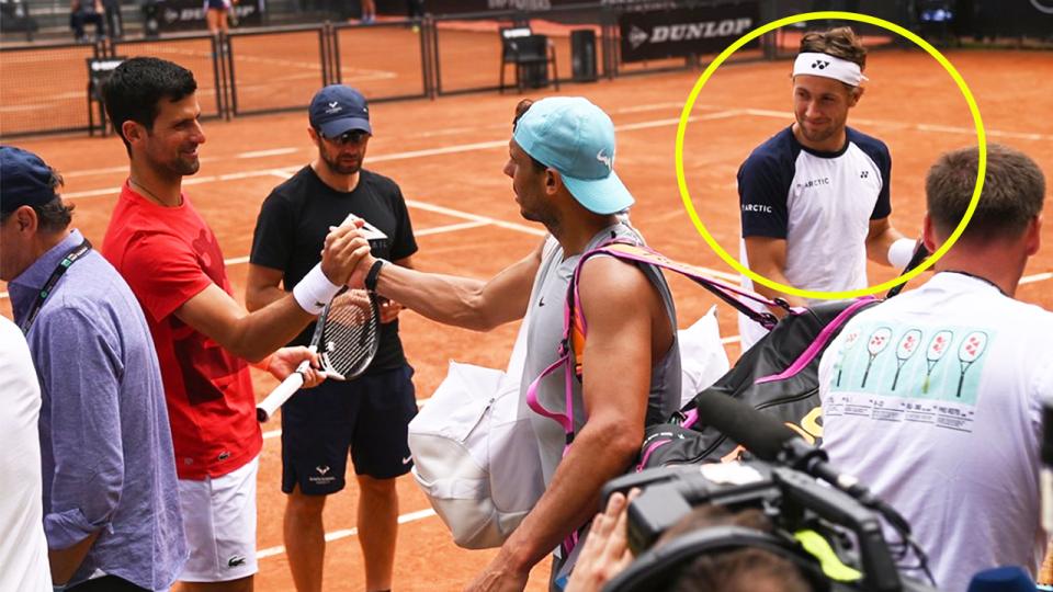 Casper Ruud (pictured right) smiles as Novak Djokovic (pictured left) and Rafa Nadal (pictured right) greeted each other.