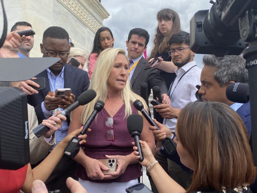 Georgia Republican U.S. Rep. Marjorie Taylor Greene speaks with reporters on the steps of the U.S. Capitol on Thursday, April 18, 2024.